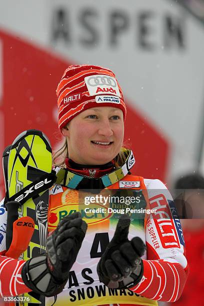 Tanja Poutiainen of Finland takes the podium after she finished third in the Slalom at the 2008 Aspen Winternational Audi Women's FIS Alpine World...