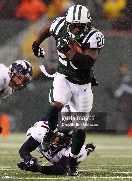 Thomas Jones of the New York Jets runs the ball for a touchdown in the first quarter against the Denver Broncos on November 30, 2008 at Giants...