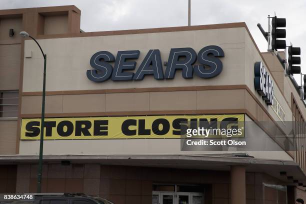 Sign announcing the store will be closing hangs above a Sears store on August 24, 2017 in Chicago, Illinois. Sears Holdings Corporation, which owns...