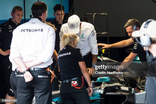 Lewis from Great Britain of team Mercedes GP testing how to get out the car with the Halo during the Formula One Belgian Grand Prix at Circuit de...