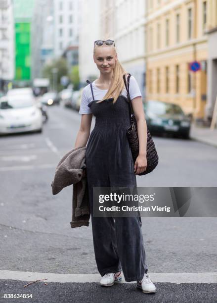 Model wearing a grey overall outside Vanessa Rudjord on August 24, 2017 in Oslo, Norway.