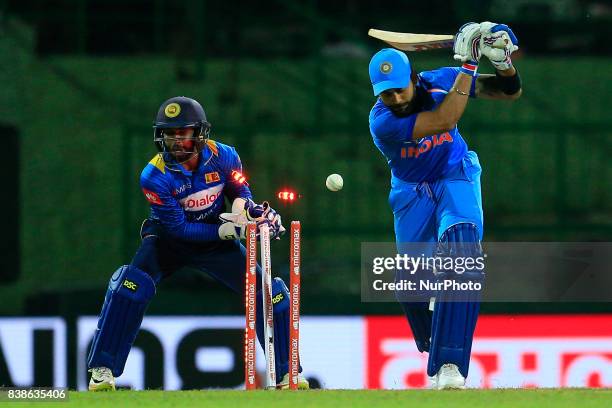 Indian cricket captain Virat Kohli is bowled out during the 2nd One Day International cricket match between Sri Lanka and India at the Pallekele...