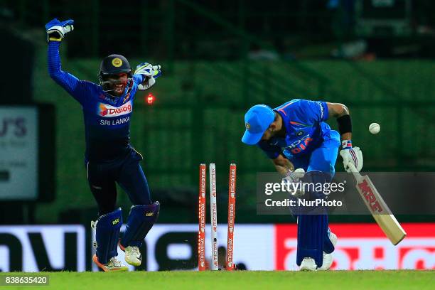 Indian cricket captain Virat Kohli is bowled out during the 2nd One Day International cricket match between Sri Lanka and India at the Pallekele...