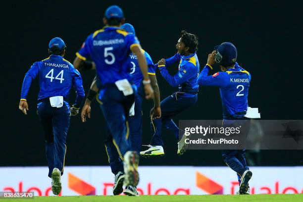 Sri Lankan cricketer and spinning bowler Akila Dananjaya in celebration mood after taking 5 wickets during the 2nd One Day International cricket...