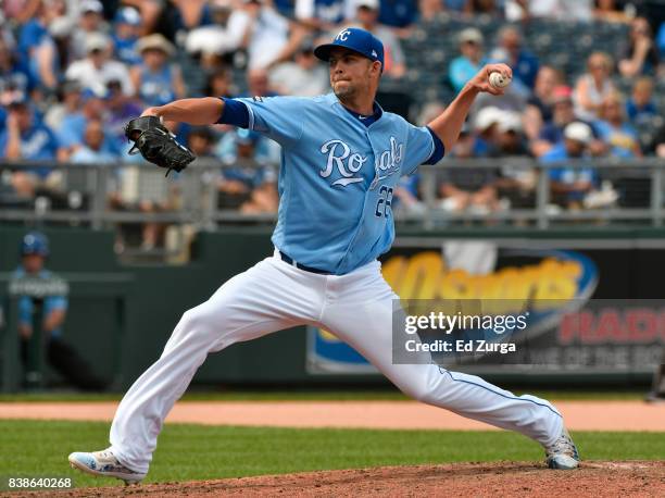 Mike Minor of the Kansas City Royals throws in the eighth inning against the Colorado Rockies at Kauffman Stadium on August 24, 2017 in Kansas City,...