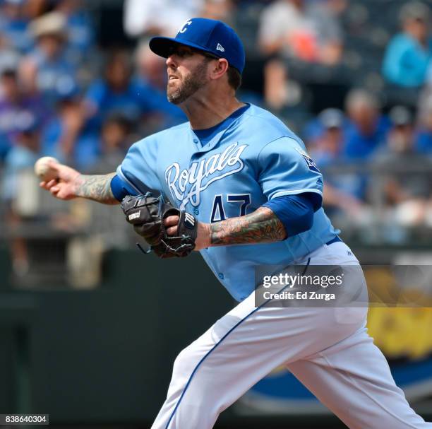 Peter Moylan of the Kansas City Royals throws in the eighth inning against the Colorado Rockies at Kauffman Stadium on August 24, 2017 in Kansas...