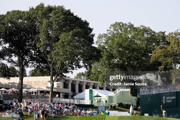 Dustin Johnson of the United States plays his shot from the 17th tee during round one of The Northern Trust at Glen Oaks Club on August 24, 2017 in...