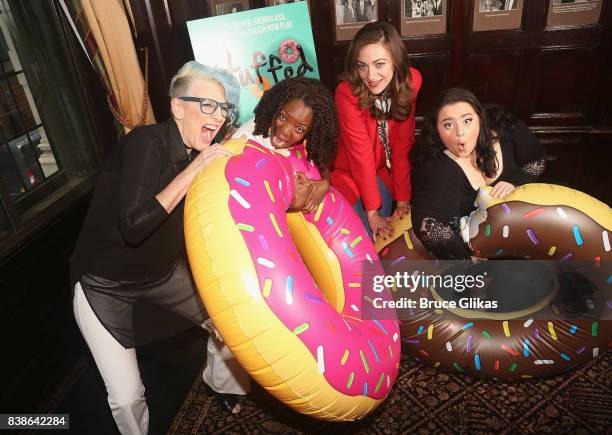 Lisa Lampanelli, Marsha Stephanie Blake, Eden Malyn and Nikki Blonsky pose at a photo call for the new comedy "Stuffed" at The Friars Club on August...