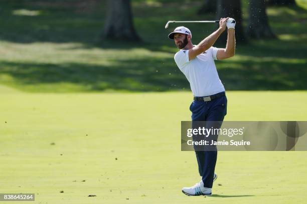 Dustin Johnson of the United States plays a shot on the tenth hole during round one of The Northern Trust at Glen Oaks Club on August 24, 2017 in...