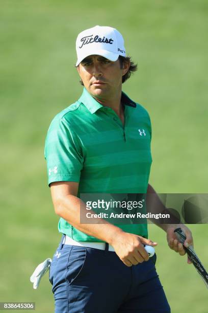 Martin Flores of the United States walks on the second green during round one of The Northern Trust at Glen Oaks Club on August 24, 2017 in Westbury,...