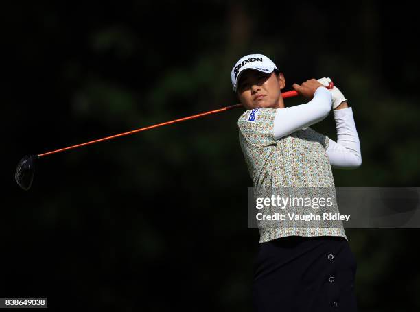 Sakura Yokomine of Japan watches her shot on the fourth hole during round one of the Canadian Pacific Women's Open at the Ottawa Hunt & Golf Club on...
