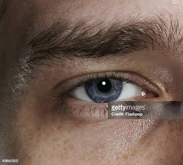 close-up of eye - eyes stockfoto's en -beelden