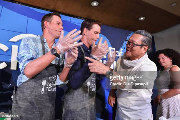Tennis players Mike and Bob Bryan and Chef Masaharu Morimoto do a demonstration at the Citi VIP Lounge at Taste Of Tennis at W New York on August 24,...