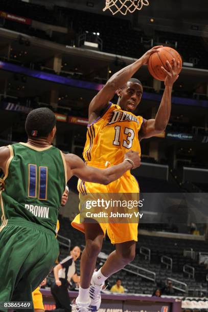 Brandon Heath of the Los Angeles D-Fenders pulls down a rebound against Damone Brown of the Reno Bighorns during their game at Staples Center on...