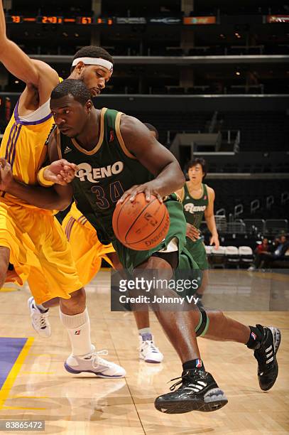 Antonio Meeking of the Reno Bighorns drives to the hoop during the game against the Los Angeles D-Fenders at Staples Center on November 30, 2008 in...