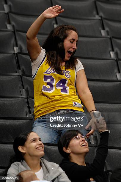 Fan dances during the game between the Reno Bighorns and the Los Angeles D-Fenders at Staples Center on November 30, 2008 in Los Angeles, California....