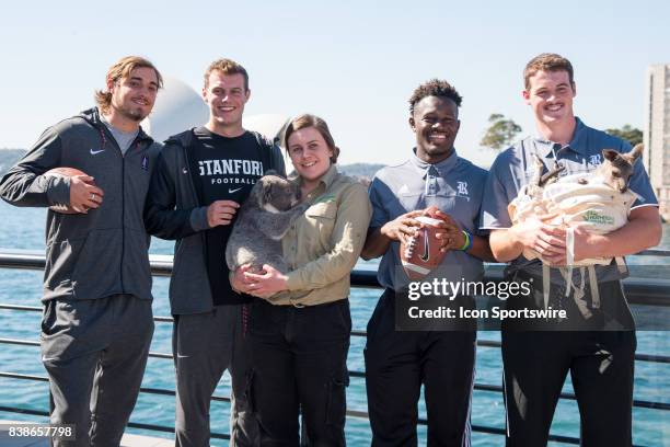 Stanford Cardinal punter Jake Bailey , place kicker Jet Toner , Rice Owls Rice Owls running back Nahshon Ellerbe , place kicker Jack Fox with a Koala...