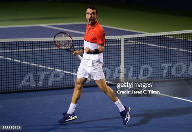 Roberto Bautista Agut of Spain reacts after defeating Taylor Fritz during their quarterfinals match of the Winston-Salem Open at Wake Forest...