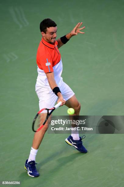 Roberto Bautista Agut of Spain returns a shot to Taylor Fritz during their quarterfinals match of the Winston-Salem Open at Wake Forest University on...