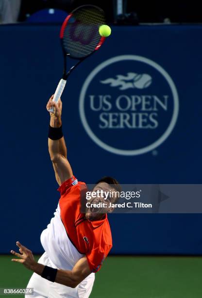 Roberto Bautista Agut of Spain serves to Taylor Fritz during their quarterfinals match of the Winston-Salem Open at Wake Forest University on August...