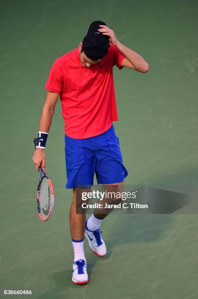 Taylor Fritz reacts after a point against Roberto Bautista Agut of Spain during their quarterfinals match of the Winston-Salem Open at Wake Forest...