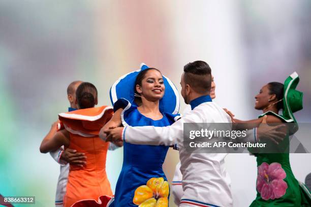 Dancers perform during the celebration event in which UNESCO recognized "Merengue" as an intangible heritage of humanity in Santo Domingo, on August...