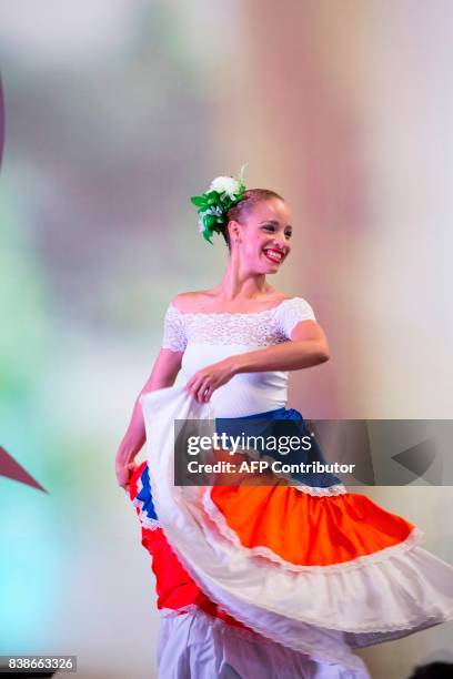 Dancer performs during the celebration event in which UNESCO recognized "Merengue" as an intangible heritage of humanity in Santo Domingo, on August...