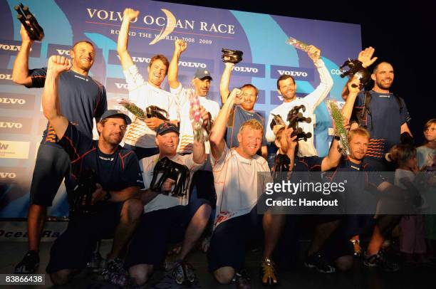 In this handout image provided by Volvo Ocean Race, the crew of Ericsson 4, skippered by Torben Grael from Brazil celebrate winning the second leg of...