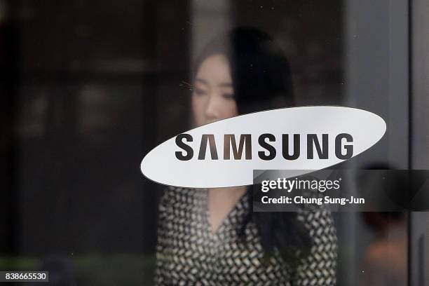 The Samsung logo is displayed at the Samsung office on August 25, 2017 in Seoul, South Korea. Prosecutors are seeking a 12-year jail sentence. Lee,...