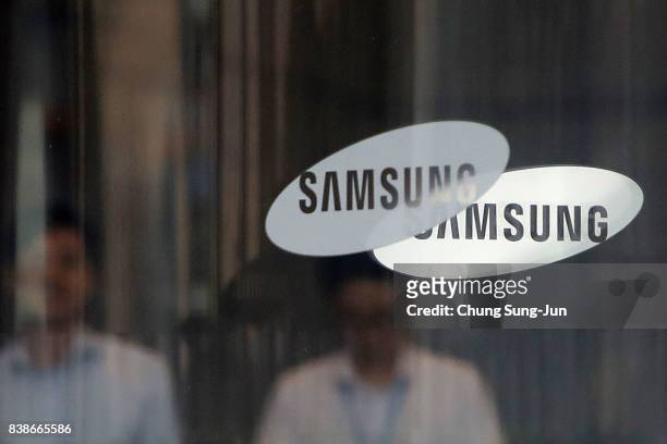 The Samsung logo is displayed at the Samsung office on August 25, 2017 in Seoul, South Korea. Prosecutors are seeking a 12-year jail sentence. Lee,...