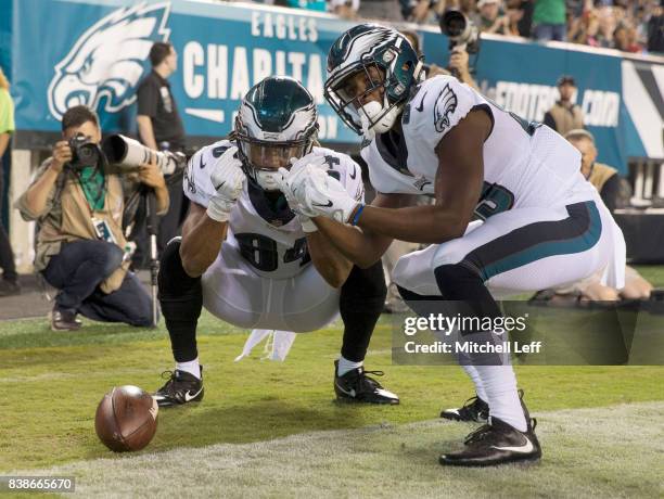 Marcus Johnson and Greg Ward Jr. #89 of the Philadelphia Eagles celebrate after a touchdown by Johnson in the fourth quarter against the Miami...