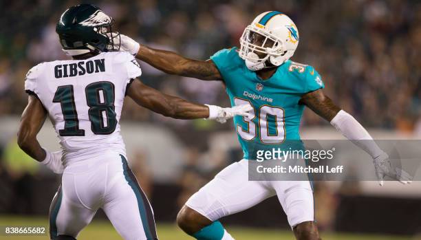 Cordrea Tankersley of the Miami Dolphins covers Shelton Gibson of the Philadelphia Eagles in the fourth quarter of the preseason game at Lincoln...