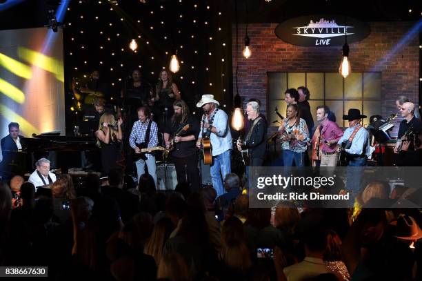 Jerry Lee Lewis, Lee Ann Womack, Chris Stapleton, Toby Keith, Kris Kristofferson, Waylon Payne, and George Strait perform onstage during Skyville...