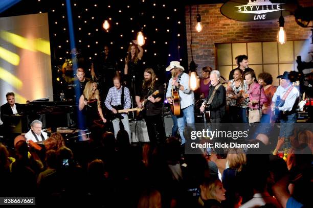 Jerry Lee Lewis, Lee Ann Womack, Chris Stapleton, Toby Keith, Kris Kristofferson, Waylon Payne, and George Strait perform onstage during Skyville...