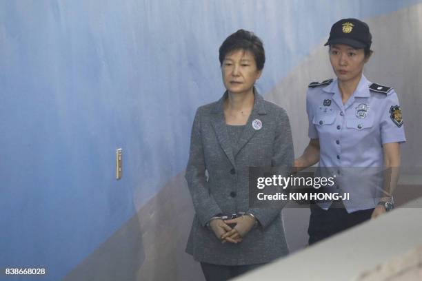 South Korean ousted leader Park Geun-hye arrives at a court in Seoul on August 25, 2017. The heir to the Samsung business empire, including the...