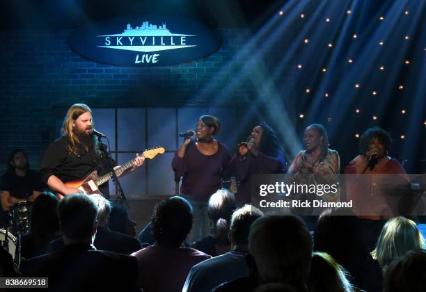 Chris Stapleton and Alfreda McCrary, Regina McCrary, Deborah McCrary, and Ann McCrary of The McCrary Sisters perform onstage during Skyville Live...