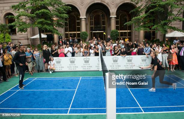 Tennis players Nick Kyrgios and Eugenie Bouchard play badminton during the 2017 Lotte New York Palace Invitational at Lotte New York Palace on August...
