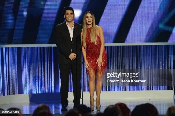 Gabriel Porras and Catherine Siachoque on stage at Telemundo's 2017 "Premios Tu Mundo" at American Airlines Arena on August 24, 2017 in Miami,...