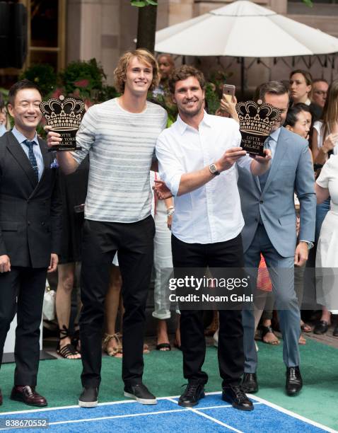 Tennis players Alexander Zverev Jr. And Mischa Zverev pose for a photo during the 2017 Lotte New York Palace Invitational at Lotte New York Palace on...