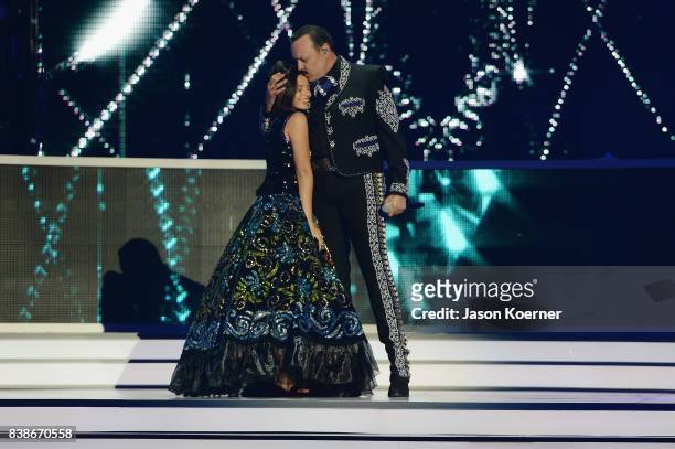 Angela Aguilar and Pepe Aguilar perform on stage at Telemundo's 2017 "Premios Tu Mundo" at American Airlines Arena on August 24, 2017 in Miami,...