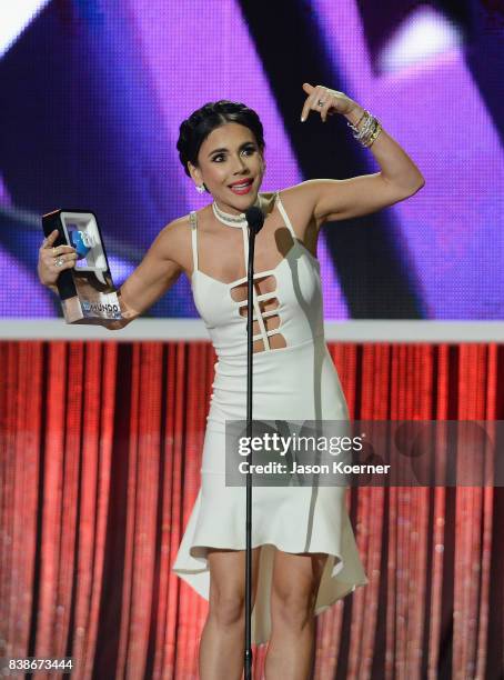 Carolina Gaitan accepts award on stage at Telemundo's 2017 "Premios Tu Mundo" at American Airlines Arena on August 24, 2017 in Miami, Florida.