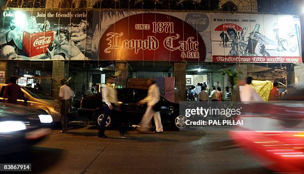 Leopard Cafe Walking Past Cafe Photos and Premium High Res Pictures - Getty Images
