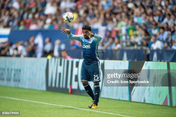 Vancouver Whitecaps midfielder Sheanon Williams throws the ball into play during their match against the Seattle Sounders at BC Place on August 23,...