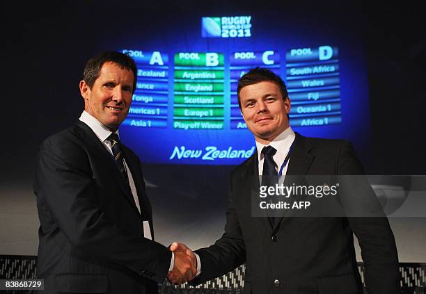 Australia coach, Robbie Deans and Ireland's captain Brian O'Driscoll shake hands during the IRB Rugby World Cup 2011 Pool Allocation Draw in London,...