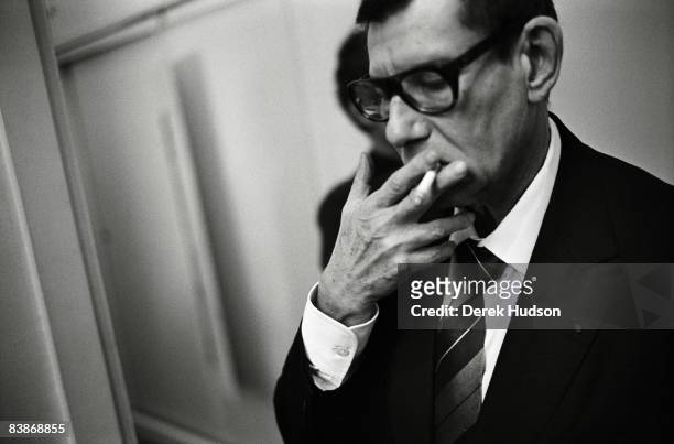 French stylist Yves Saint Laurent poses at a portrait session in Paris on May 13, 1998. .