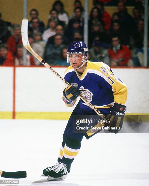 Jim Carson of the Los Angeles Kings skates against the Boston Bruins at Boston Garden.