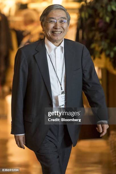 Haruhiko Kuroda, governor of the Bank of Japan , arrives for a dinner during the Jackson Hole economic symposium, sponsored by the Federal Reserve...