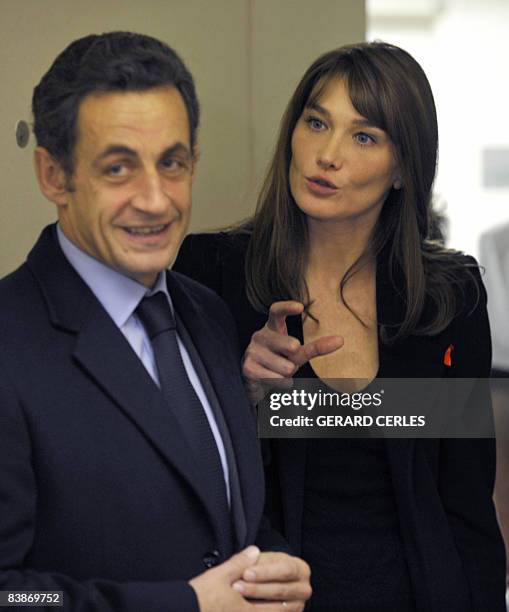 French President Nicolas Sarkozy's and his wife Carla Bruni Sarkozy visit a special unit for HIV/AIDS sufferers at the Saint-Louis Hospital in Paris...