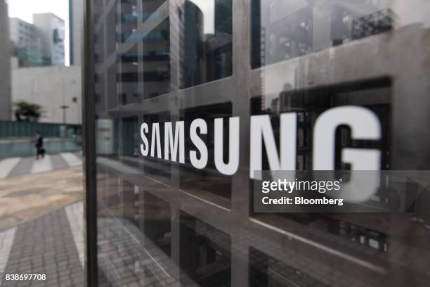 The Samsung Electronics Co. Logo is displayed at the company's Seocho office building in Seoul, South Korea, on Friday, Aug. 25, 2017. The stakes are...
