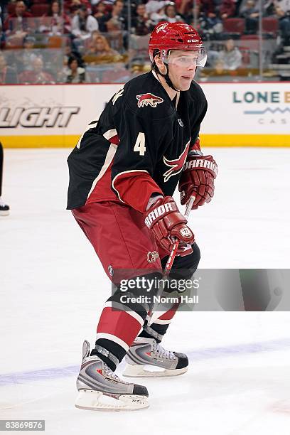 Zbynek Michalek of the Phoenix Coyotes looks to stop the puck at his own blue line against the Colorado Avalanche on November 28, 2008 at Jobing.com...